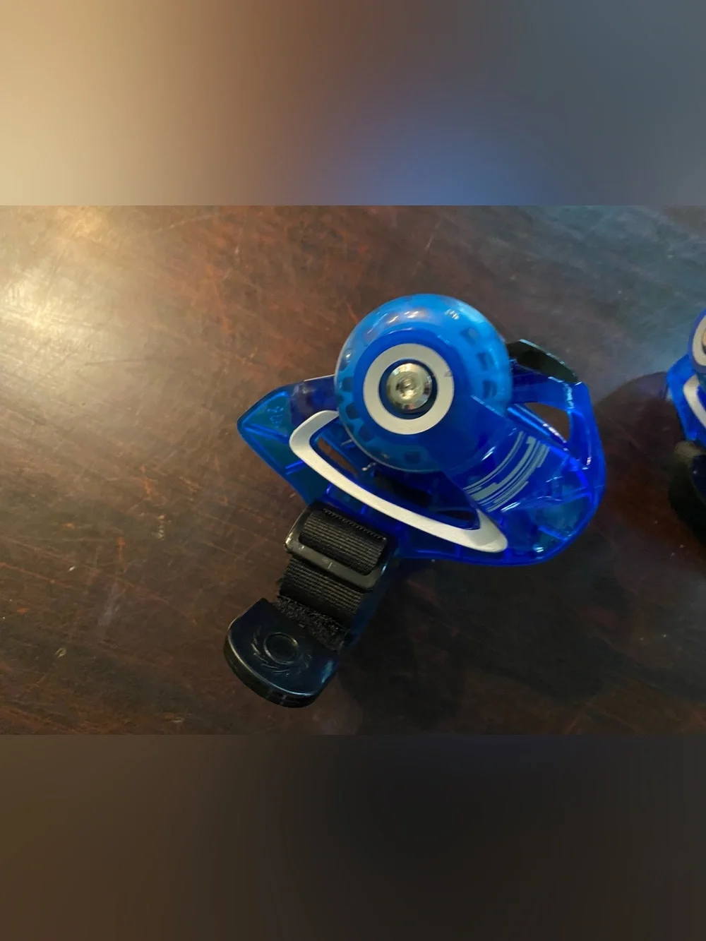 Razor Blue LED Strap-On Skate Heels with Black Razor Straps